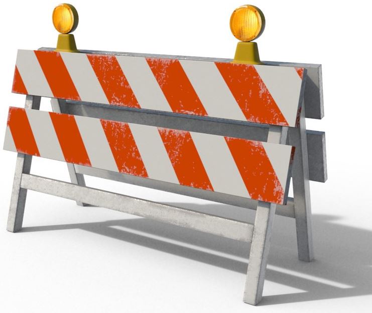 orange striped construction barricade with amber lights